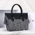 Gray cashmere with black ostrich leather flap tote