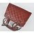 Dark red caviar leather handle bag