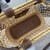 Woven fabric handbag with leather trim