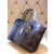 Calf hair leather handle bag