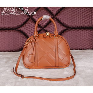 Embossing leather top handle bag