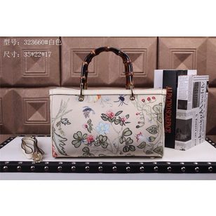 Flower pattern canvas bamboo handle bag