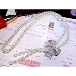 Chanel Rhinestone bow knot pearls long necklace