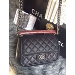 Chanel Large calfskin flap bag with a rigid handle