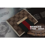 Gucci bi-fold with engraved gucci